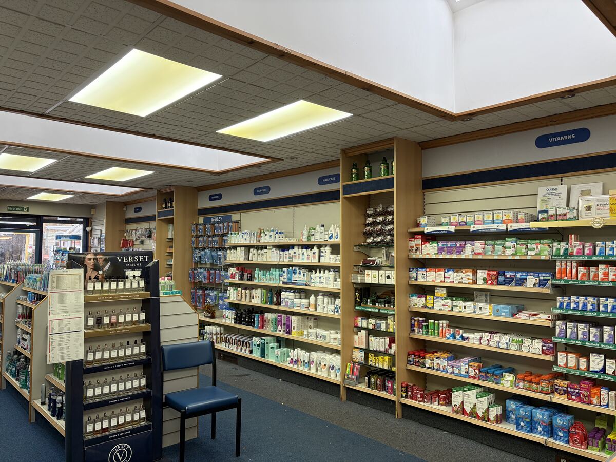 Shelves of vitamins and healthcare products inside Lindsay Chemist